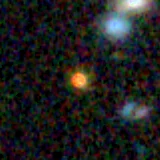 Colour composite: F444W red, F356W green, F277W blue, 3.2 arcsec across, north up
