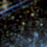 Colour composite: F444W red, F356W green, F277W blue, 3.2 arcsec across, north up
