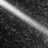 F115W image, 3.2 arcsec across, north up