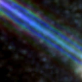 Colour composite: F444W red, F356W green, F277W blue, 3.2 arcsec across, north up