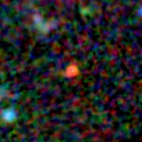 Colour composite: F444W red, F356W green, F277W blue, 3.2 arcsec across, north up