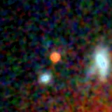 Colour composite: F444W red, F356W green, F277W blue, 3.2 arcsec across, north up