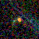 Colour composite: F444W red, F356W green, F277W blue, 3.2 arcsec across, north up