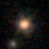 Colour composite: F444W red, F356W green, F277W blue, 3.2 arcsec across, north up
