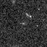 F115W image, 3.2 arcsec across, north up
