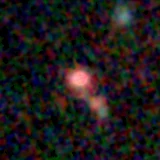 Colour composite: F444W red, F356W green, F277W blue, 3.2 arcsec across, north up