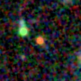 Colour composite: F444W red, F356W green, F277W blue, 3.2 arcsec across, north up