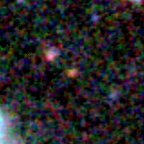 Colour composite: F444W red, F356W green, F277W blue, 3.2 arcsec across, north up