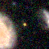 Colour composite: F444W red, F356W green, F277W blue, 3.2 arcsec across, north up