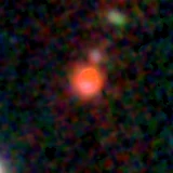 Colour composite: F444W red, F356W green, F277W blue, 3.2 arcsec across, north up