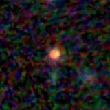 Colour composite: F444W red, F356W green, F277W blue, 3.2 arcsec across, north up
