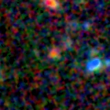 Colour composite: F444W red, F356W green, F277W blue, 3.2 arcsec across, north up
