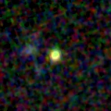 Colour composite: F444W red, F356W green, F277W blue, 3.2 arcsec across, north up