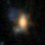 Colour composite: F444W red, F356W green, F277W blue, 3.2 arcsec across, north up