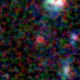 Colour composite: F444W red, F356W green, F277W blue, 3.2 arcsec across, north up