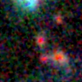 Colour composite: F444W red, F356W green, F277W blue, 3.2 arcsec across, north up