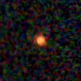 Colour composite: F444W red, F356W green, F277W blue, 3.2 arcsec across, north up