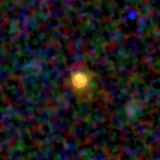 Colour composite: F444W red, F356W green, F277W blue, 3.2 arcsec across, north up