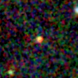 Colour composite: F444W red, F356W green, F277W blue, 3.2 arcsec across, north up