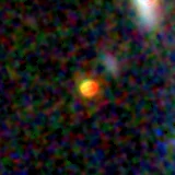 Colour composite: F444W red, F356W green, F277W blue, 3.2 arcsec across, north up