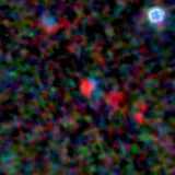 Colour composite: F444W red, F356W green, F277W blue, 3.2 arcsec across, north up