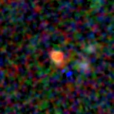 Colour composite: F444W red, F356W green, F277W blue, 3.2 arcsec across, north up