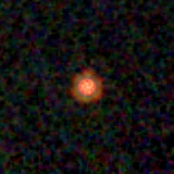 Colour composite: F444W red, F356W green, F277W blue, 3.2 arcsec across, north up
