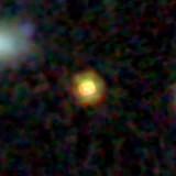 Colour composite: F444W red, F356W green, F277W blue, 3.2 arcsec across, north up