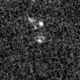 F115W image, 3.2 arcsec across, north up