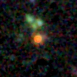 Colour composite: F444W red, F356W green, F277W blue, 3.2 arcsec across, north up