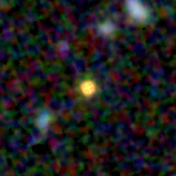 Colour composite: F444W red, F356W green, F277W blue, 3.2 arcsec across, north up