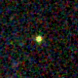 Colour composite: F444W red, F356W green, F277W blue, 3.2 arcsec across, north up