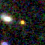 Colour composite: F444W red, F356W green, F277W blue, 3.2 arcsec across, north up
