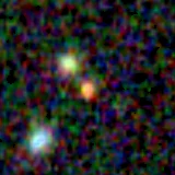 Colour composite: F444W red, F356W green, F277W blue, 3.2 arcsec across, north up