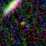 Colour composite: F444W red, F356W green, F277W blue, 3.2 arcsec across, north up
