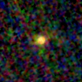 Colour composite: F444W red, F356W green, F277W blue, 3.2 arcsec across, north up