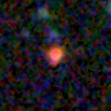 Colour composite: F444W red, F356W green, F277W blue, 3.2 arcsec across, north up