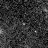 F115W image, 3.2 arcsec across, north up