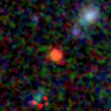 Colour composite: F444W red, F356W green, F277W blue, 3.2 arcsec across, north up