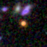 Colour composite: F444W red, F356W green, F277W blue, 3.2 arcsec across, north up