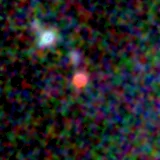 Colour composite: F444W red, F356W green, F277W blue, 3.2 arcsec across, north up