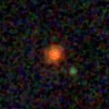 Colour composite: F444W red, F356W green, F277W blue, 3.2 arcsec across, north up