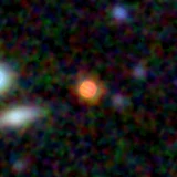 Colour composite: F444W red, F356W green, F277W blue, 3.2 arcsec across, north up