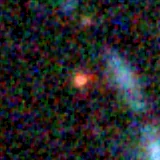 Colour composite: F444W red, F356W green, F277W blue, 3.2 arcsec across, north up