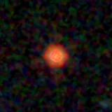 Colour composite: F444W red, F356W green, F277W blue, 3.2 arcsec across, north up