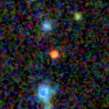Colour composite: F444W red, F356W green, F277W blue, 3.2 arcsec across, north up