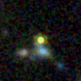Colour composite: F444W red, F356W green, F277W blue, 3.2 arcsec across, north up