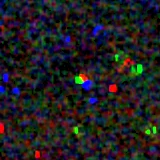 Colour composite: F444W red, F356W green, F277W blue, 3.2 arcsec across, north up