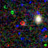 Colour composite: F444W red, F356W green, F277W blue, 3.2 arcsec across, north up
