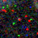 Colour composite: F444W red, F356W green, F277W blue, 3.2 arcsec across, north up
